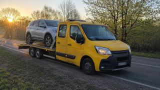 Laweta z SUV-em o wschodzie słońca – Zgierz